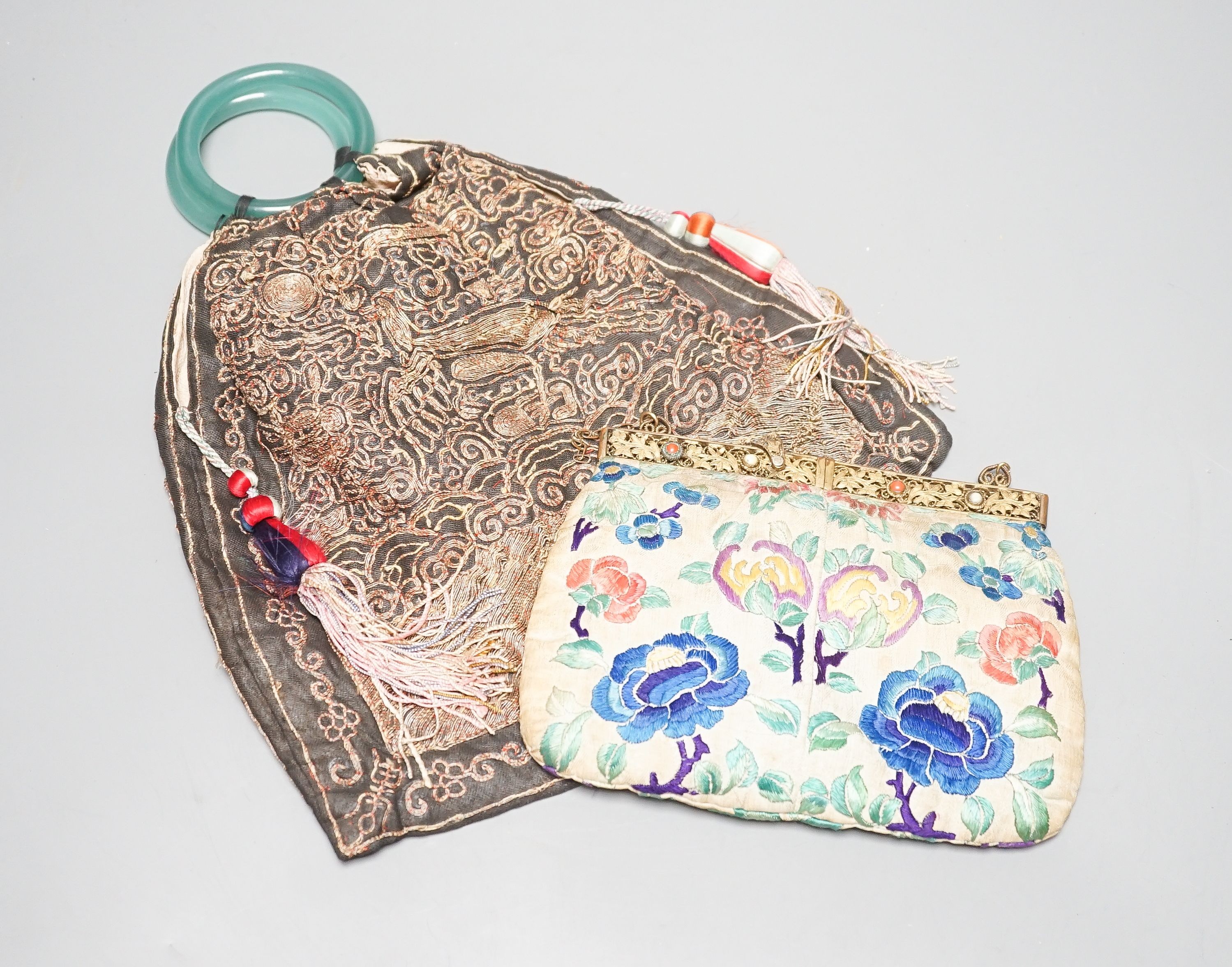 Two Chinese embroidered evening bags or purses, largest 30cm